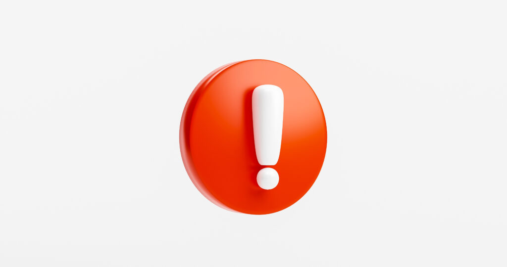 Orange circular warning icon with a white exclamation mark on a light background.